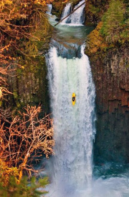 Kayaker Experiencing Long Drop Over Falls